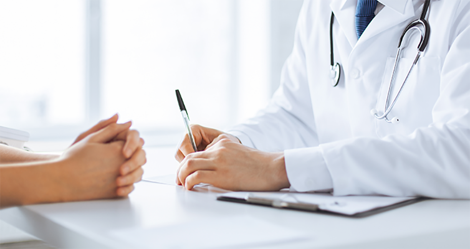 doctor writing something down